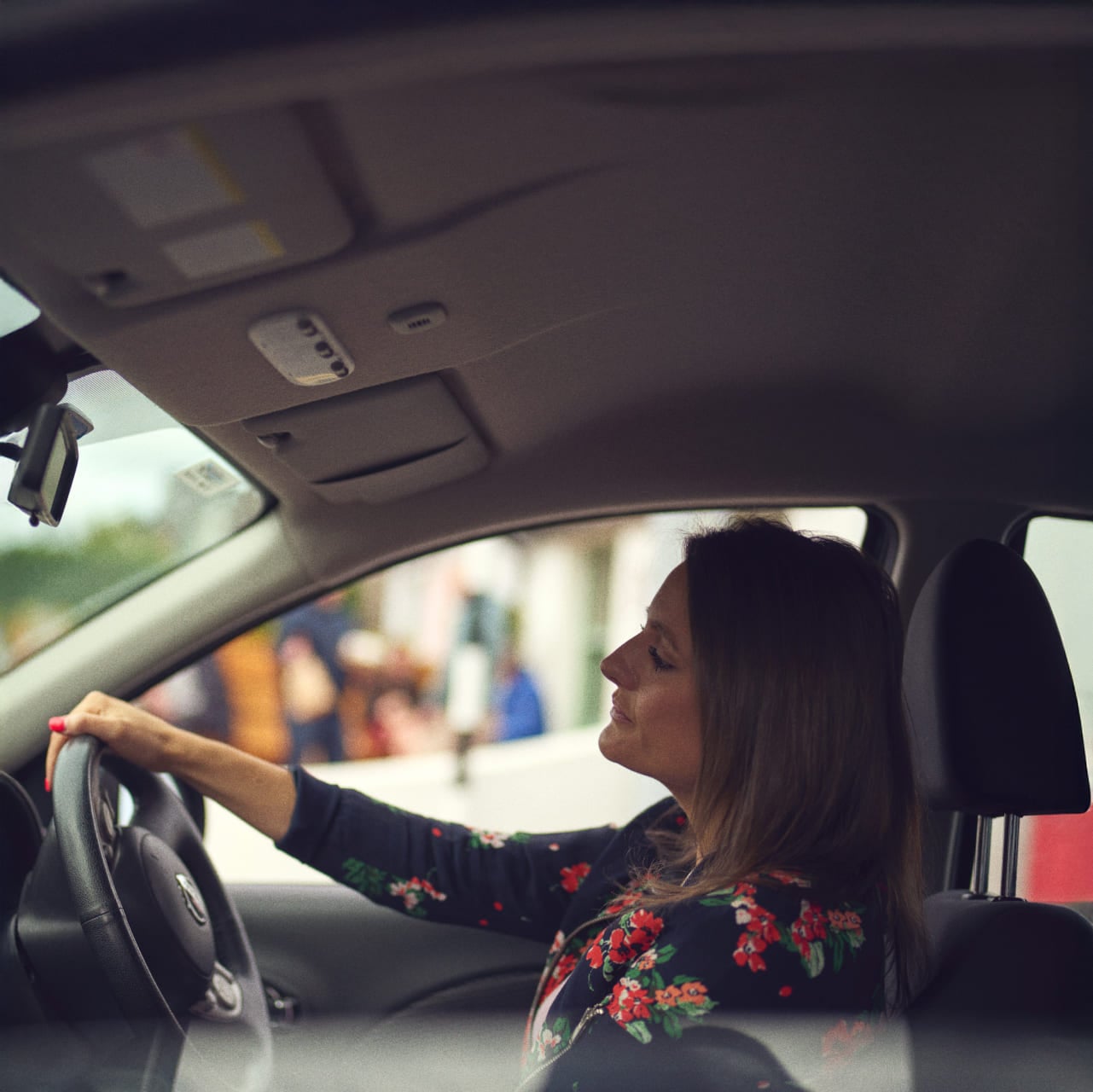 Woman driving her car